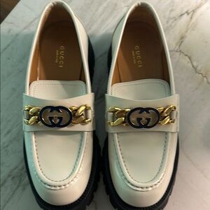 Gucci Women's White Loafers with Gold and Black Accents